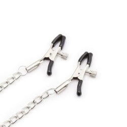 Ring Gag With Chains And Nipple Clamps